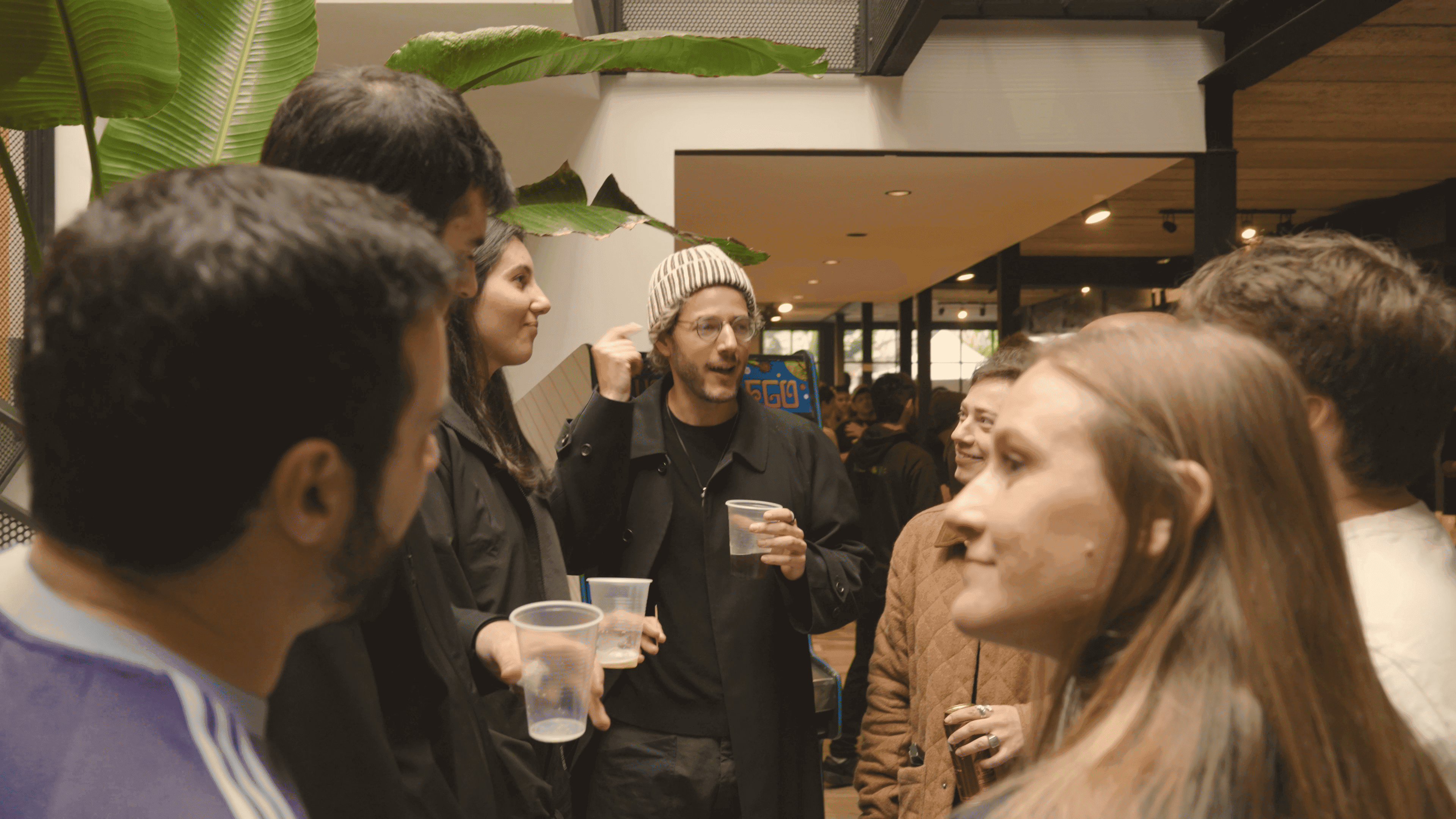 Opencode team members talking during their Buenos Aires visit