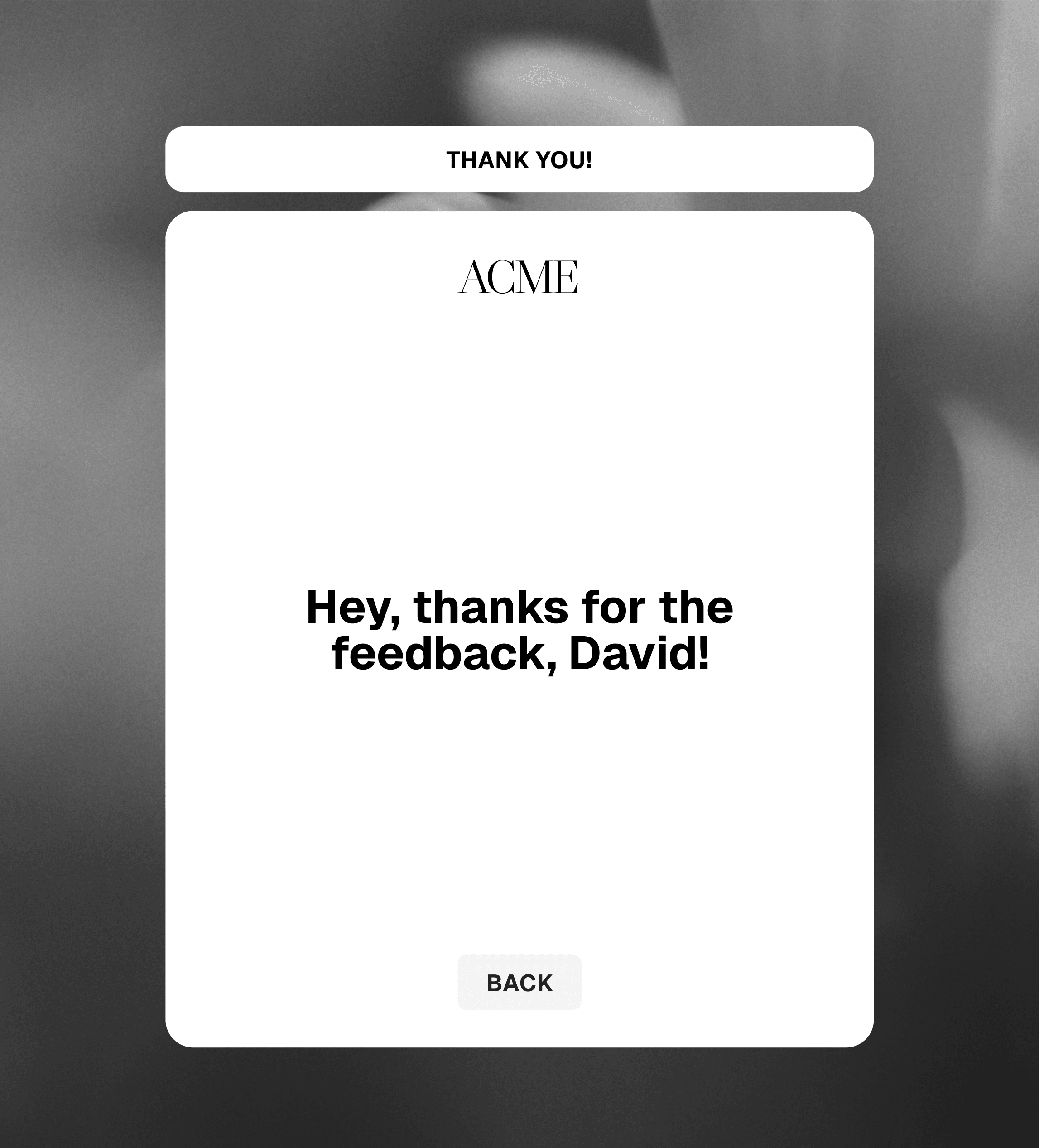 ACME thank you screen over a monochrome portrait